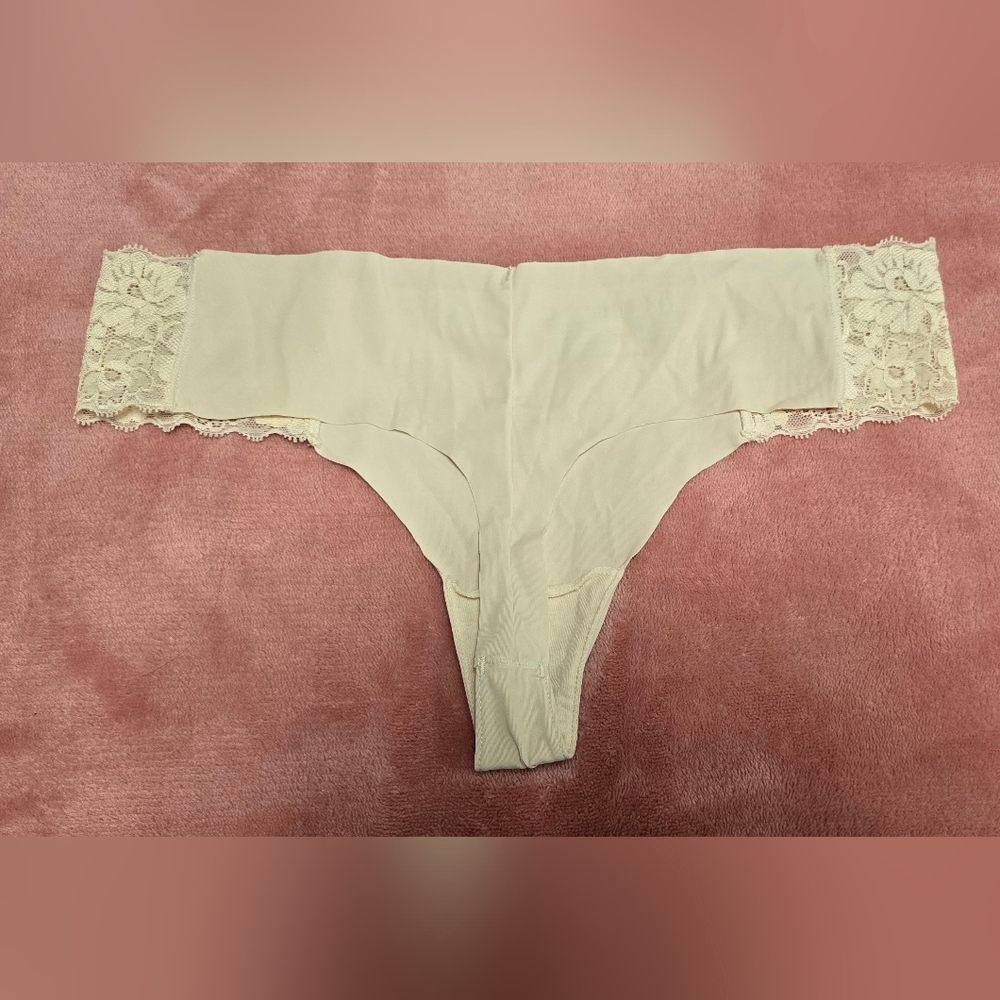 Elegant Lace Trimmed Women's Thong in Cream - Picture 2 of 3